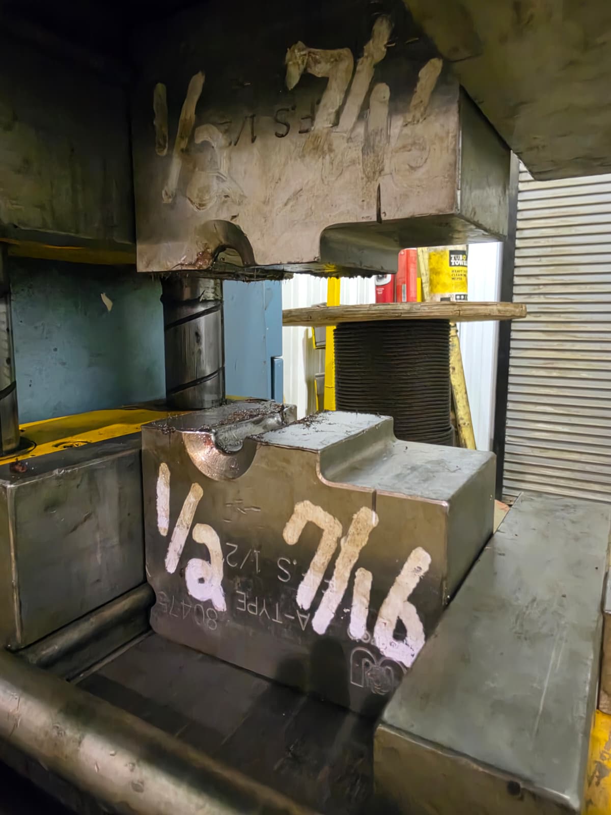 Swage die installed in the hydraulic press for repair work